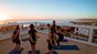 yoga terrazza tramonto surfhouse marocco